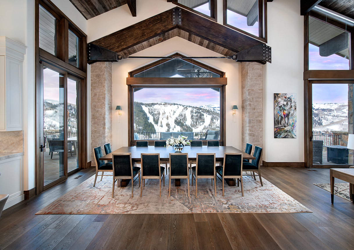 Brina 8-inch wide plank European oak flooring in a dining room framing a ski-slope panorama
