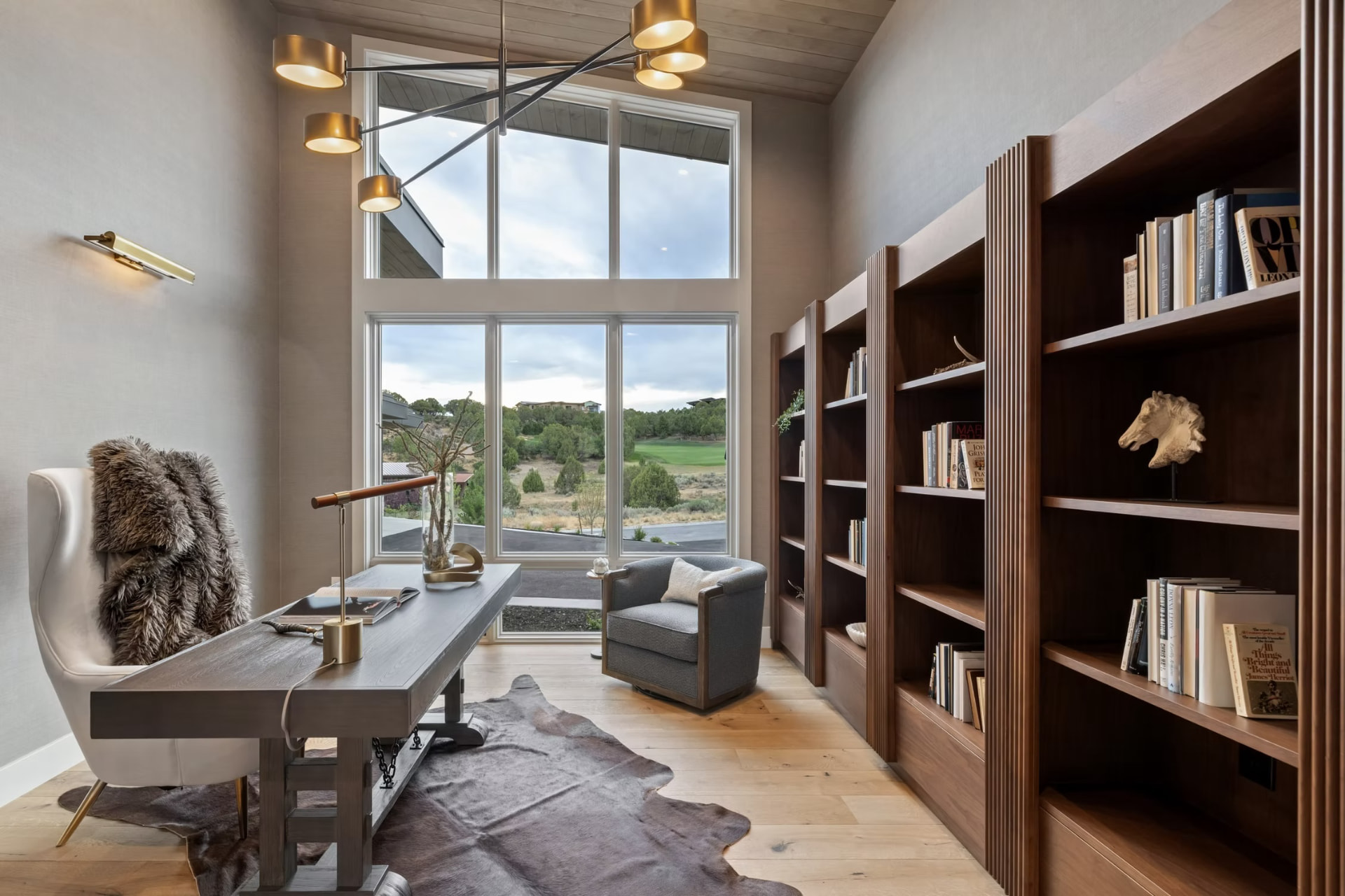 Lune wide plank European oak flooring in a study with fluted built-in millwork — Red Mountain project